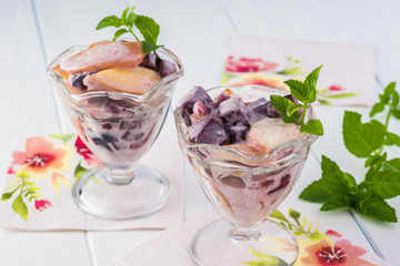 Assorted fruit salad with homemade yogurt.