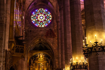 Rose window in the Cathedral of Santa Maria of Palma, also known as La Seu. Palma, Majorca, Spain © Jeanne Emmel