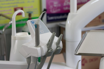 Dental, dental instruments in the dental lab. dental unit. Warm light from the filter.