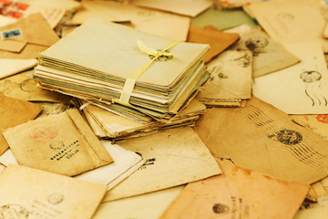 Many old paper mail letters. Envelopes are stamped: 