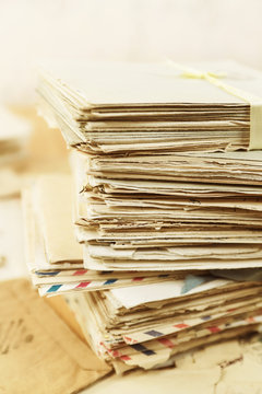 Stack of old paper mail letters closeup