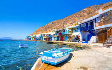 Scenic Klima village (traditional Greek village by the sea, the Cycladic-style) with sirmata -...