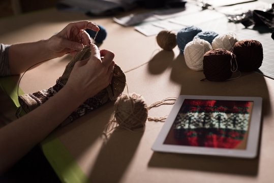 Close up of woman knitting