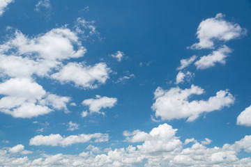 Naklejka na ściany i meble Wonderful white cumulus clouds on blue sky