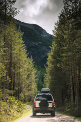 Off road car on dirt road in forest © marcin jucha