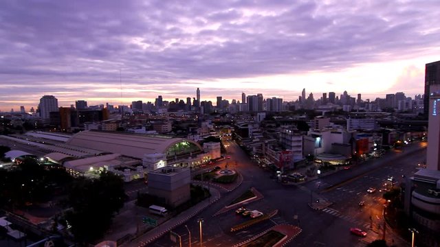 High view of city with traffic car in sunrise time / Good morning Bangkok