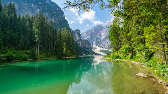 Idyllic summer landscape with mountain lake and Alps