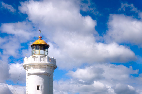 Arriluze lighthouse in Getxo with blue sky with clouds at daylight