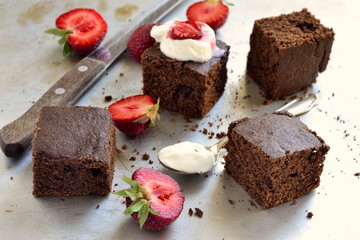 Chocolate sponge cake with strawberries and cream