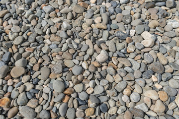 Cropped view of pebbles on a beach