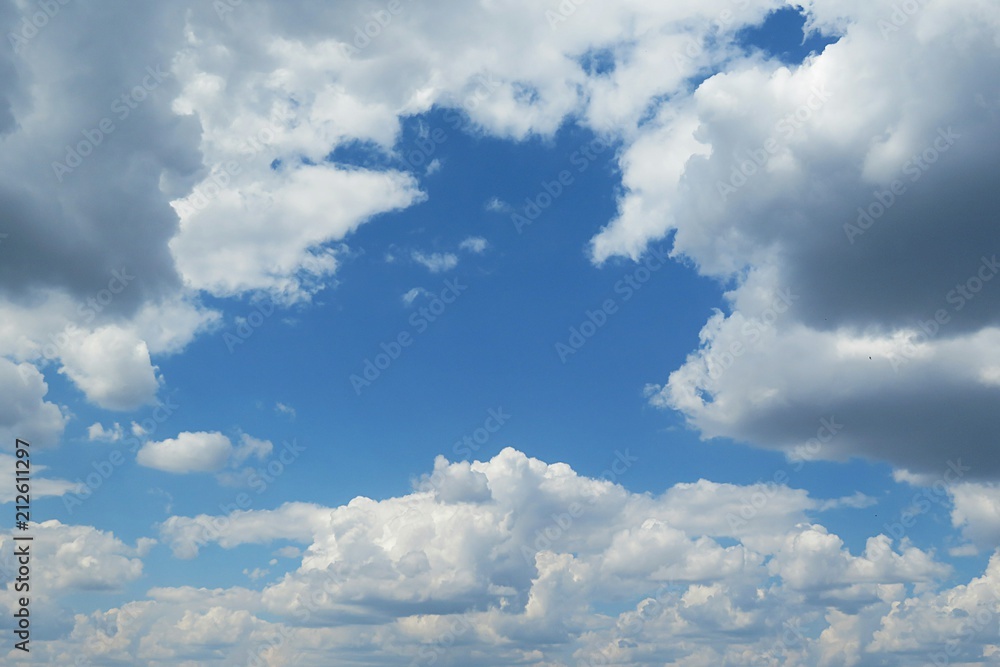 Wall mural Beautiful cloudscape in blue sky, natural background