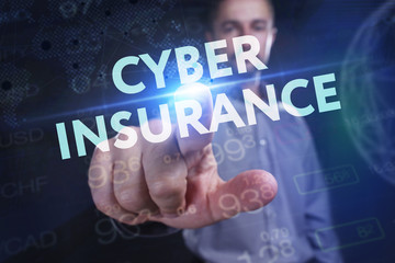The concept of business, technology, the Internet and the network. A young entrepreneur working on a virtual screen of the future and sees the inscription: Cyber insurance