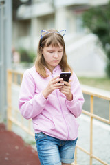 Teenage girl with a phone