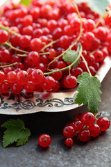 Redcurrants on a metal dish with.