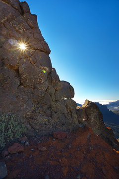 Rock with a hole through which goes sun light, above the crater Caldera de Taburiente, Island of La Palma, Canary Islands, Spain