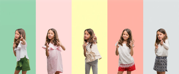 Collage of brunette hispanic girl wearing different outfits pointing fingers to camera with happy and funny face. Good energy and vibes.