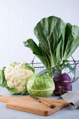 Many kinds of fresh cabbage Ingredients for the preparation of vegetable dishes. cauliflower, leaf...
