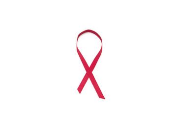 Red ribbon in the form of a sign breast cancer