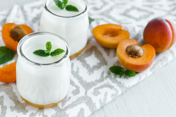 Fresh yogurt with apricots and mint