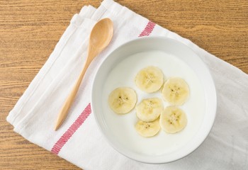 Top View of Homemade Yoghurt with Ripe Banana