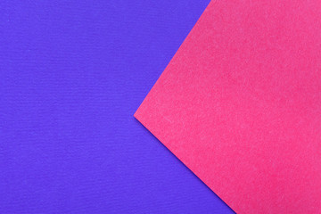 Blue and pink cardboard texture background. Trending colors, geometric background of the cardboard. Colorful soft paper background.Pastel color.