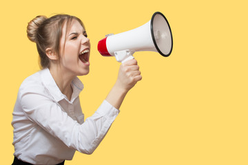 woman screaming into a megaphone