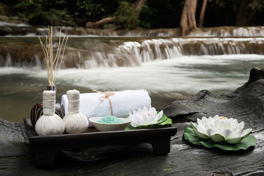 Beautiful composition of spa accessories on waterfall background. © Aunging