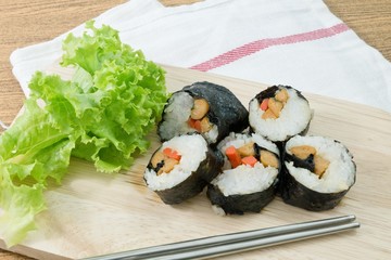 Veggie Sushi Rolls or Vegetable Maki on Wooden Board