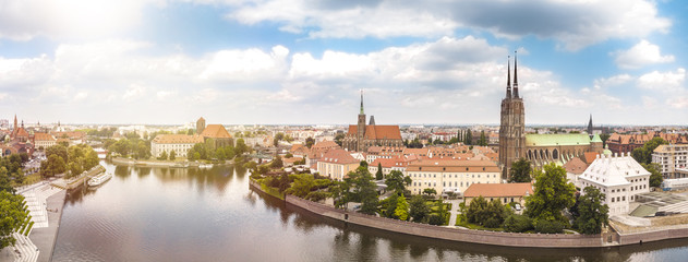 Poland. Wroclaw. Ostrow Tumski, park, and Odra River. Aerial 4K video.