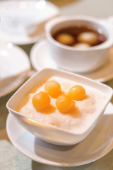 Asian dessert Sakhu in coconut milk with Cantaloupe ball topping