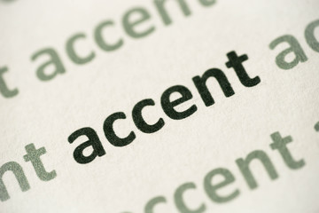 word accent printed on paper macro