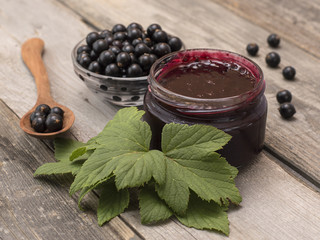 black currant on a wooden table. 