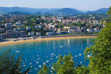 Panoramic view of  the city,ocean and  sand beach  on the sunny day .San Sebastian.Spain.