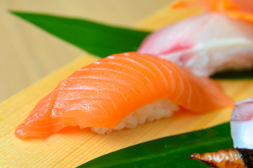 Salmon Sushi on wooden plate decoration
