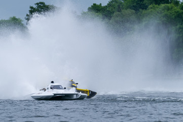 Speed boats in fast action race