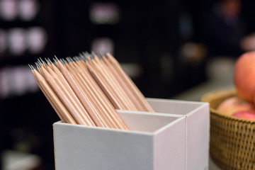 A lot of pencils in white box