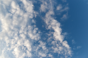 white fluffy clouds in the blue sky