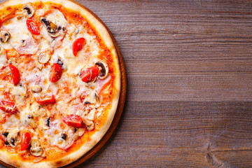 Food background, Italian pizza close up with free space. Traditional recipe, delivery, restaurant, pizzeria menu concept