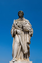 Fototapeta premium Saint Vincent's (San Vincente de Fora) statue at the Miradouro de Santa Luzia in the Alfama District of Lisbon, Portuga