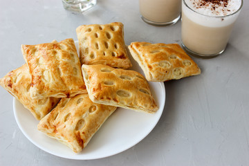 Puffs with cottage cheese served with coffee