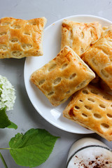 Puffs with cottage cheese served with coffee