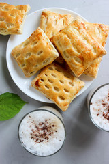 Puffs with cottage cheese served with coffee
