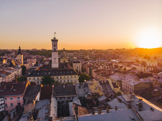 Naklejka premium aerial view of old european city on sunset