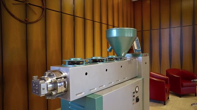 The process of working extrusion equipment.