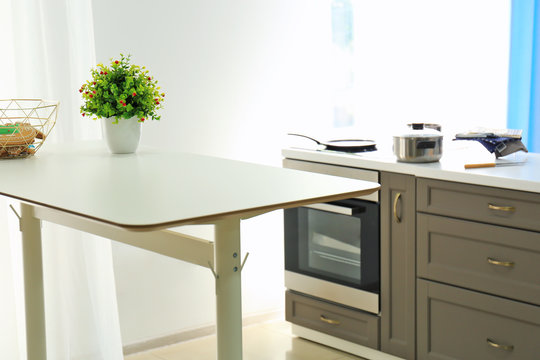 Modern kitchen interior with high table