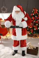 Authentic Santa Claus in traditional costume indoors