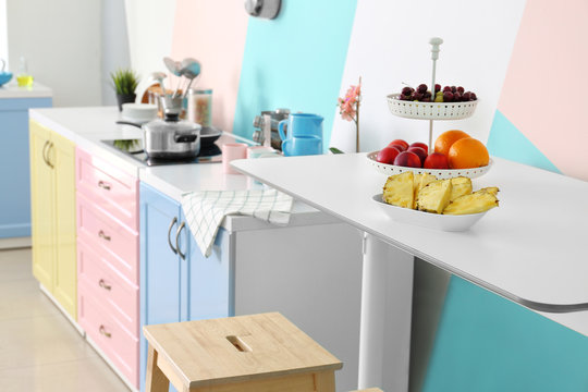 Fruits on table in modern kitchen