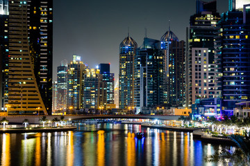 Fototapeta na wymiar Dubai marina modern and shiny skyscrapers view at night