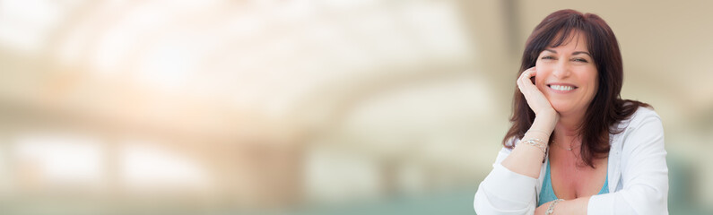 Banner of Middle Aged Woman With Abstract Building Background