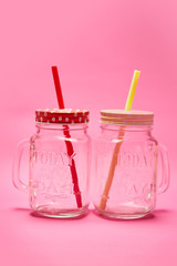 Empty mug with a straw